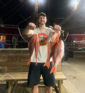 Grant Raleigh, PT at ARCPT+ Wichita East Clinic, with many fish that he's caught.